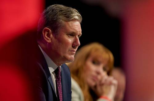 Labour leader Sir Keir Starmer and Labour deputy leader Angela Rayner listen as shadow chancellor Rachel Reeves gives her keynote speech at the Labour Party conference at the Brighton Centre. Picture date: Monday September 27, 2021.